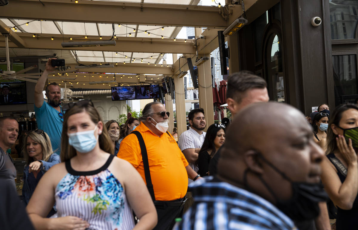 People watch the World Popcorn Eating Championship during the "Red Carpet Film Feast" ...