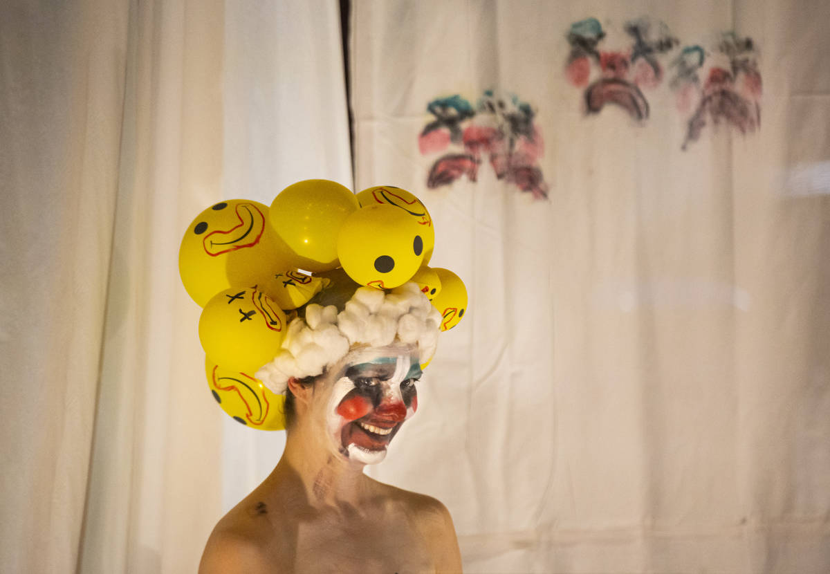 Heidi Rider performs from the windows of the Majestic Repertory Theatre in the Arts District of ...
