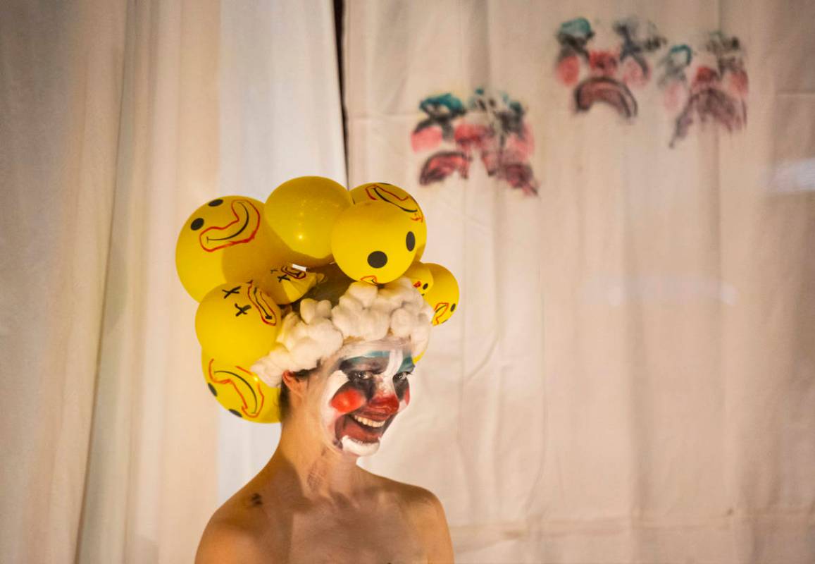 Heidi Rider performs from the windows of the Majestic Repertory Theatre in the Arts District of ...