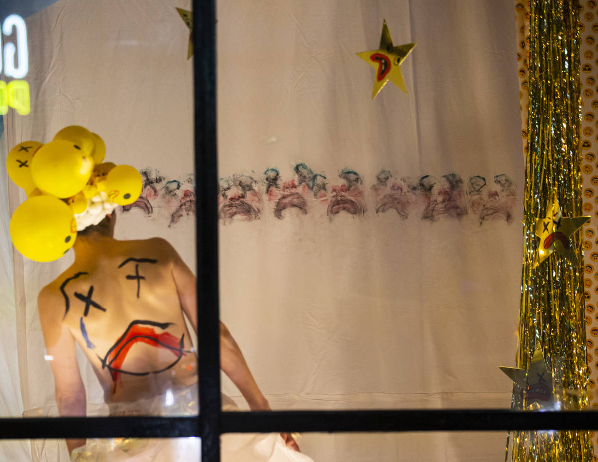 Heidi Rider performs from the windows of the Majestic Repertory Theatre in the Arts District of ...