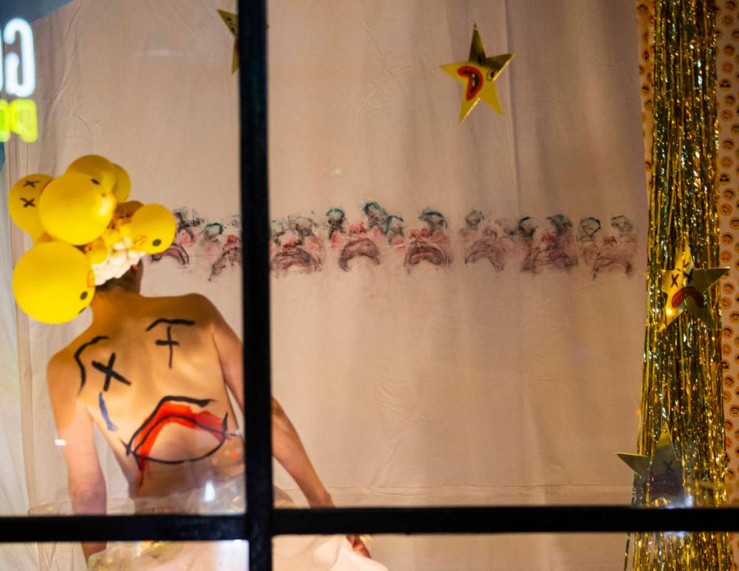Heidi Rider performs from the windows of the Majestic Repertory Theatre in the Arts District of ...