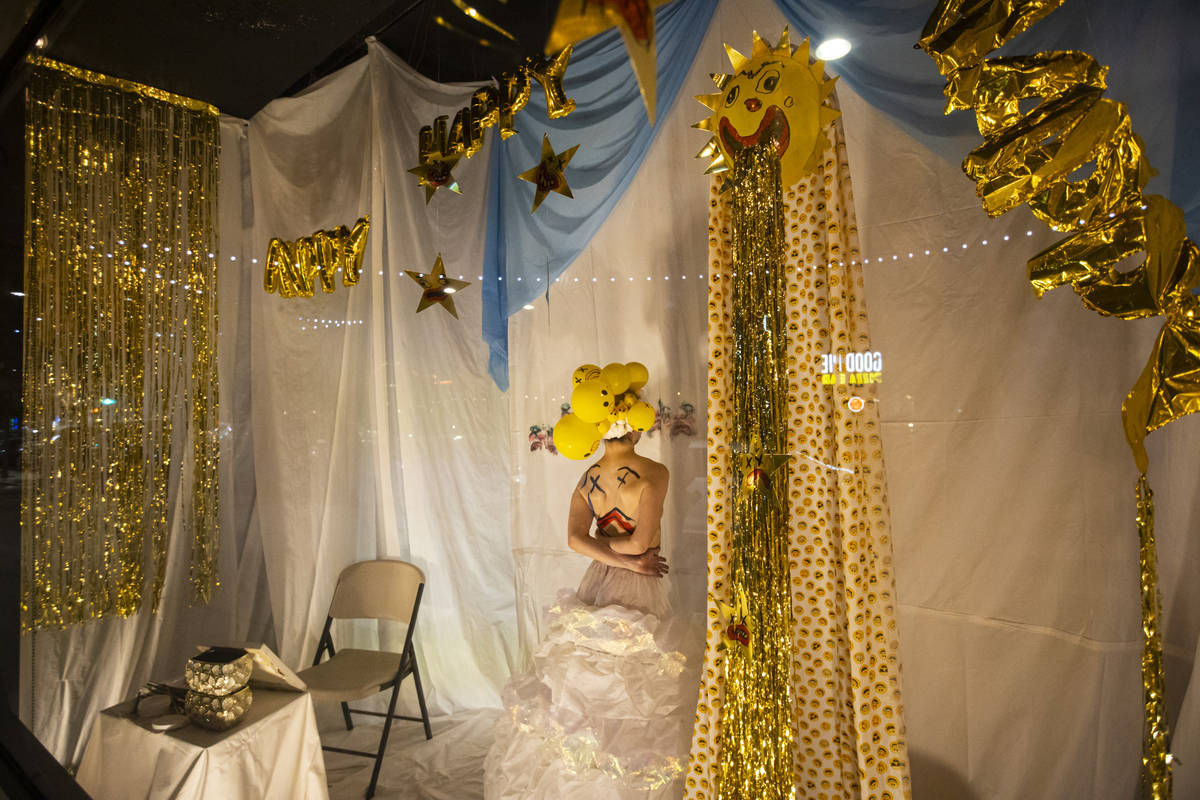 Heidi Rider performs from the windows of the Majestic Repertory Theatre in the Arts District of ...