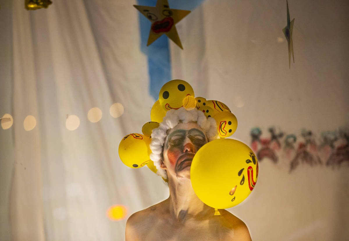 Heidi Rider performs from the windows of the Majestic Repertory Theatre in the Arts District of ...