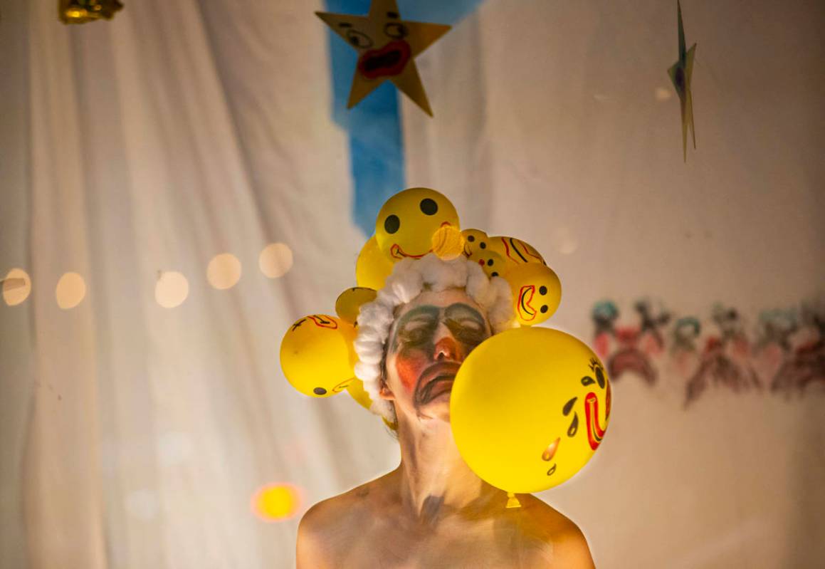 Heidi Rider performs from the windows of the Majestic Repertory Theatre in the Arts District of ...