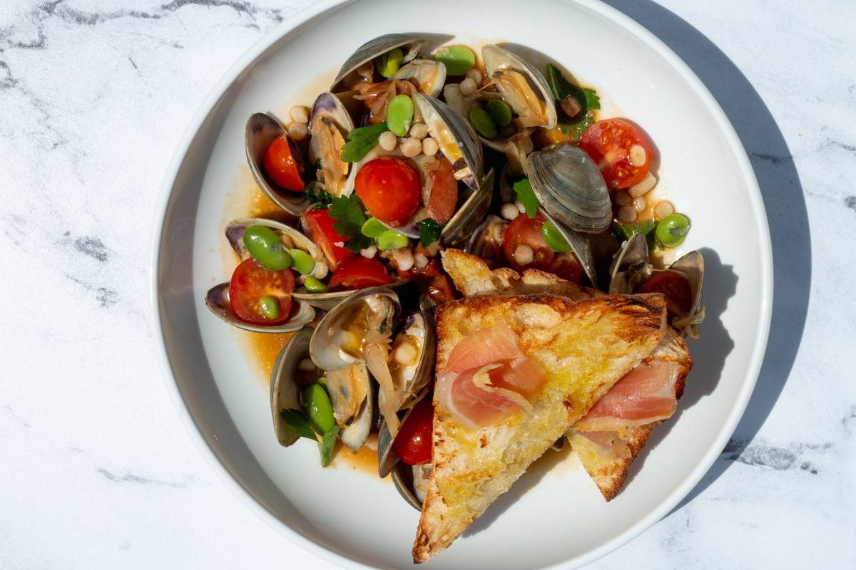 Brezza's littleneck clams with fava beans, prosciutto brodo and fennel. (Shane Judge @thelvfe)