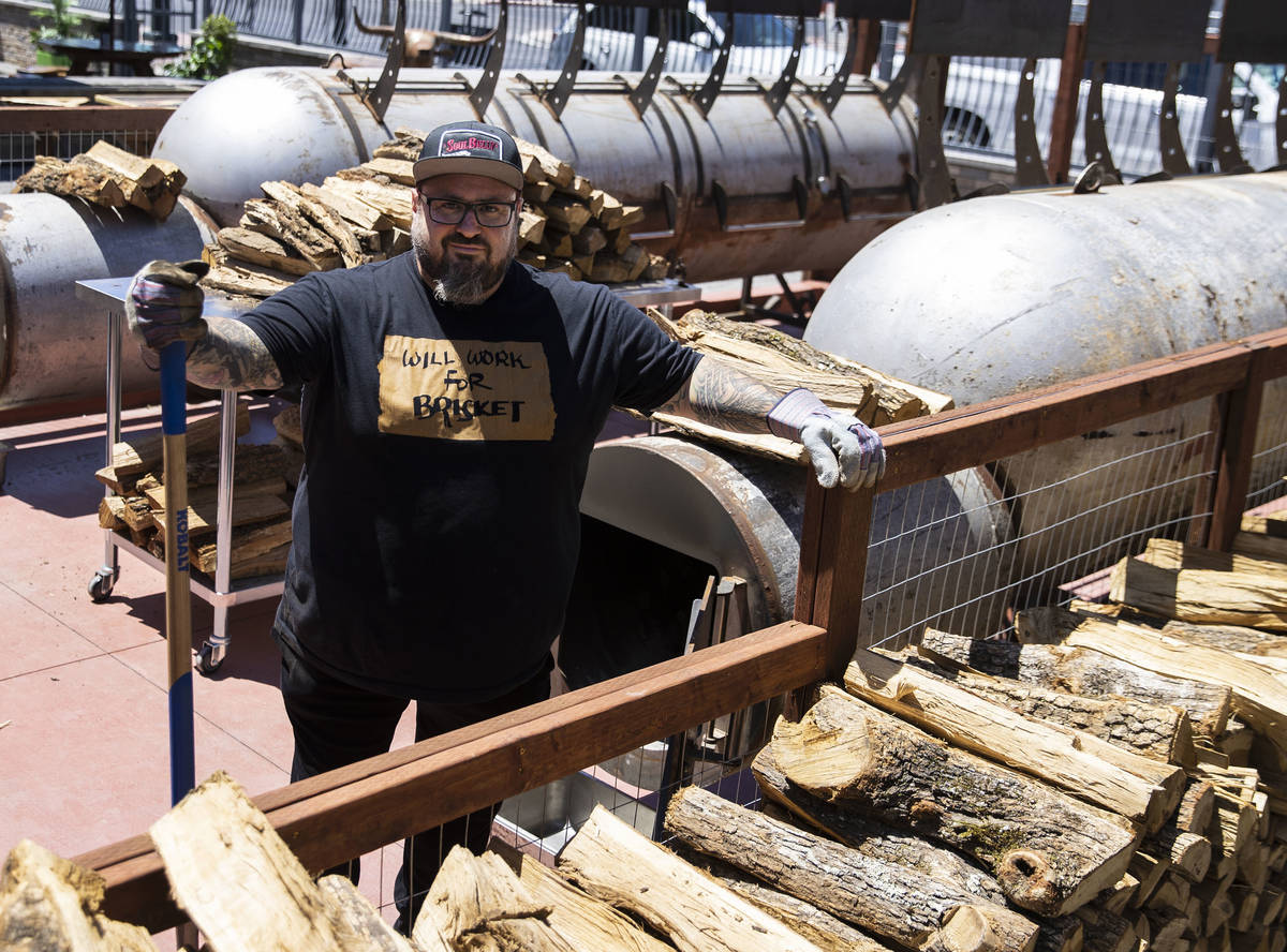 Bruce Kalman, chef and owner of Soulbelly BBQ, Arts District BBQ spot, poses for a photo in fro ...