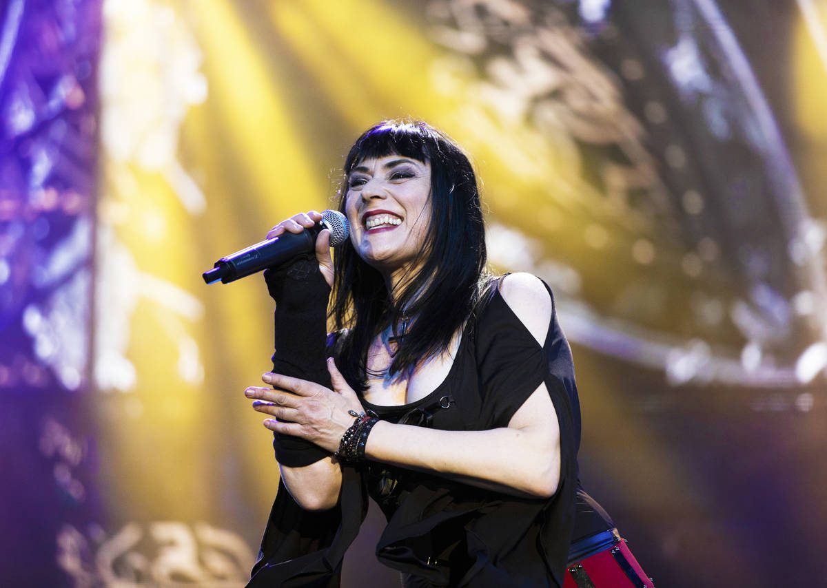 Elyzabeth Diaga, lead singer in “Queens of Rock,” performs at Mosaic on the Strip ...