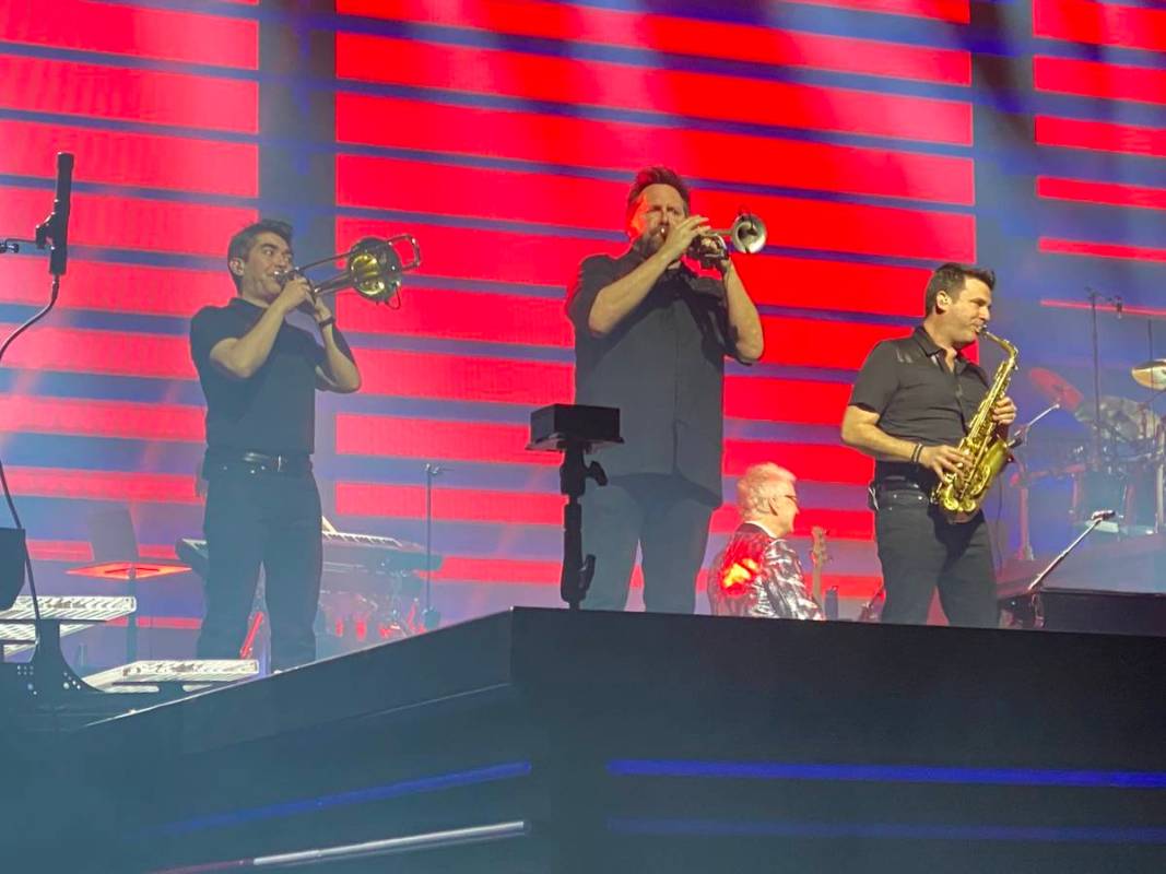 Nathan Tanouye, Matt Fronke and Eric Tewalt are shown performing with Celine Dion at Bridgeston ...