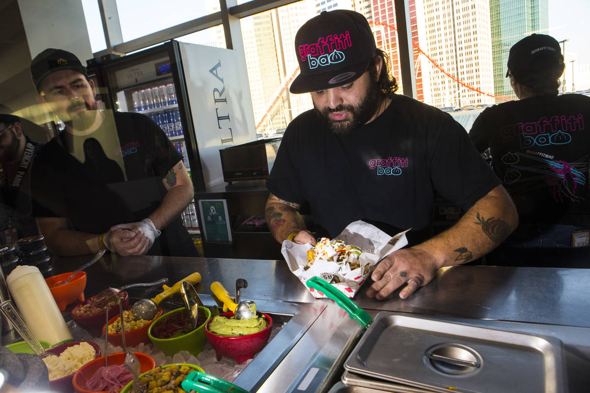Graffiti Bao and Pina Nachos owner and chef Marc Marrone, pictured here at a Golden Knights gam ...