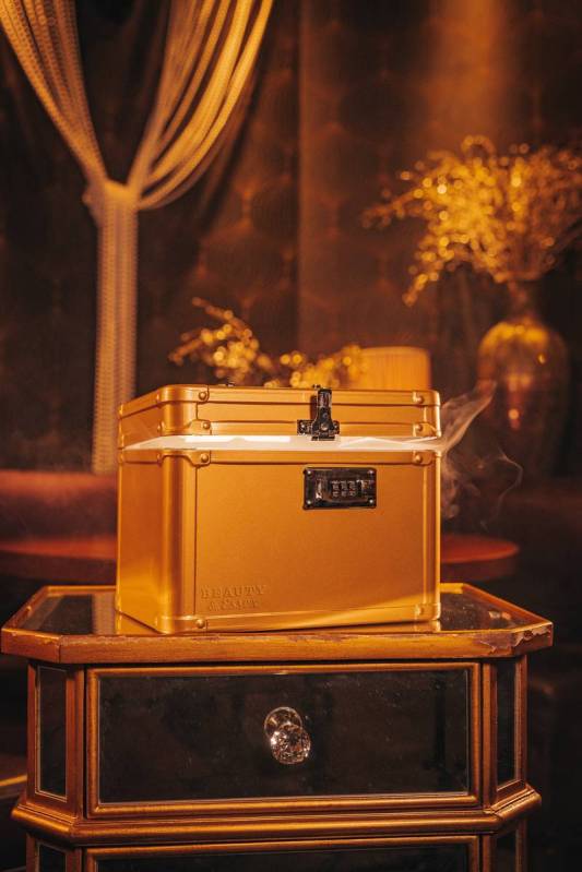 The Speakeasy Burger at Beauty & Essex arrives in a locked box. (Beauty & Essex)