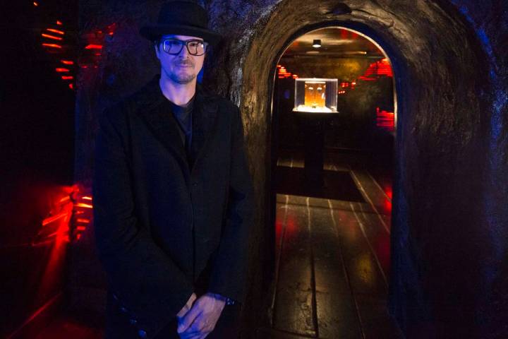 Ghost hunter Zak Bagans poses outside the room holding his Dybbuk Box, known as the world's mos ...