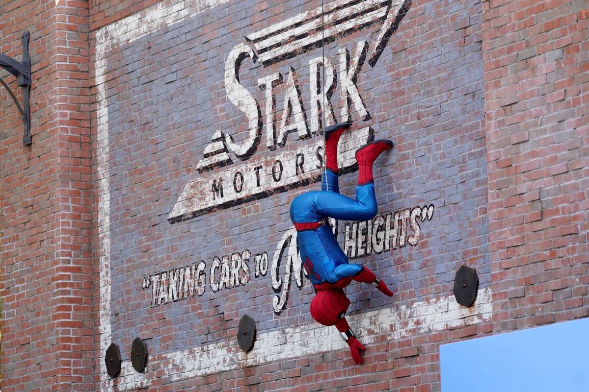 A Spider-Man character performs during "The Amazing Spider-Man!" show at the Avengers Campus me ...