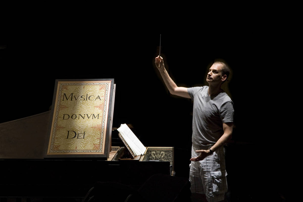 Conductor Gregory Buchalter, who is the Artistic Director of Opera Las Vegas, conducts a scene ...