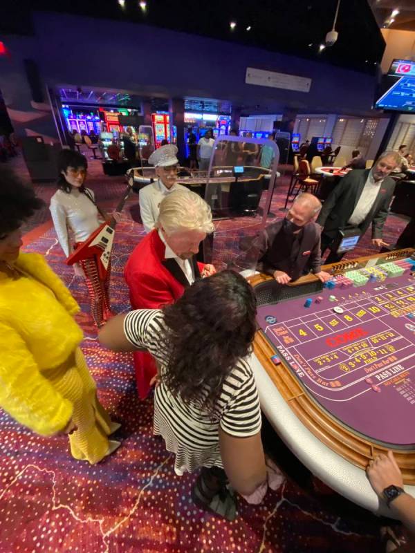 Virgin Group founder Richard Branson is shown at a Virgin Hotels Las Vegas craps table, Friday, ...