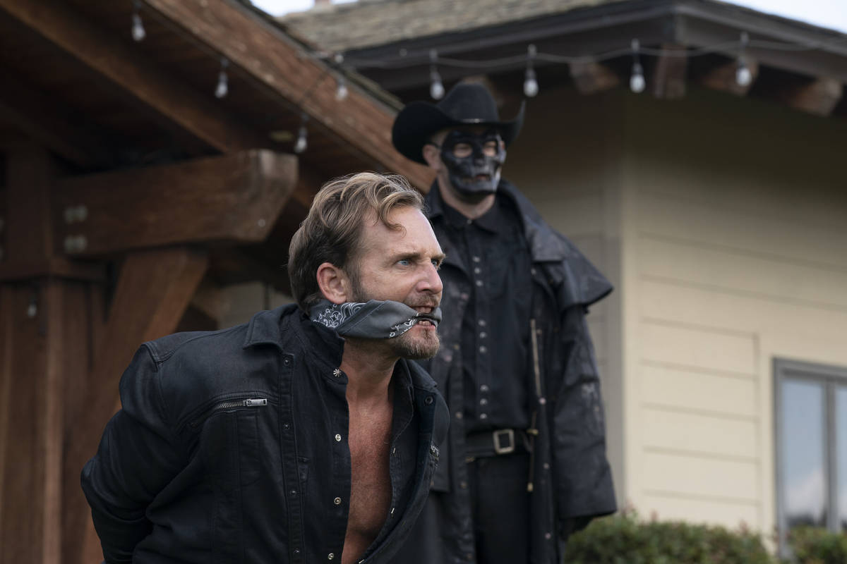 (from left) Dylan Tucker (Josh Lucas) and a Purger in The Forever Purge, directed by Everardo G ...