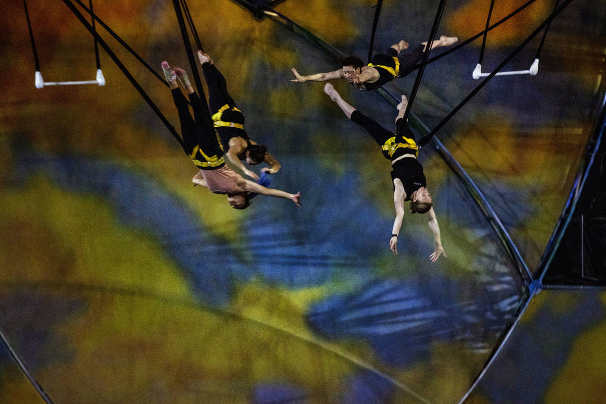 Acrobats rehearse one of several acts in "Mystere," a Cirque du Soleil production whi ...