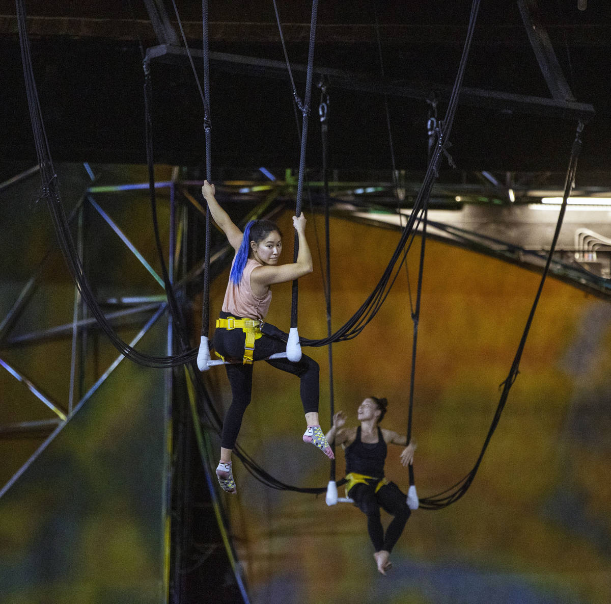 Acrobats rehearse one of several acts in "Mystere," a Cirque du Soleil production whi ...