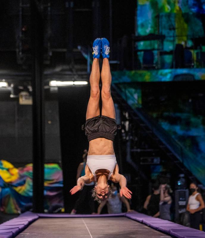 Acrobat Sarah Turner practices flips on a power track trampoline during rehearsals for "My ...