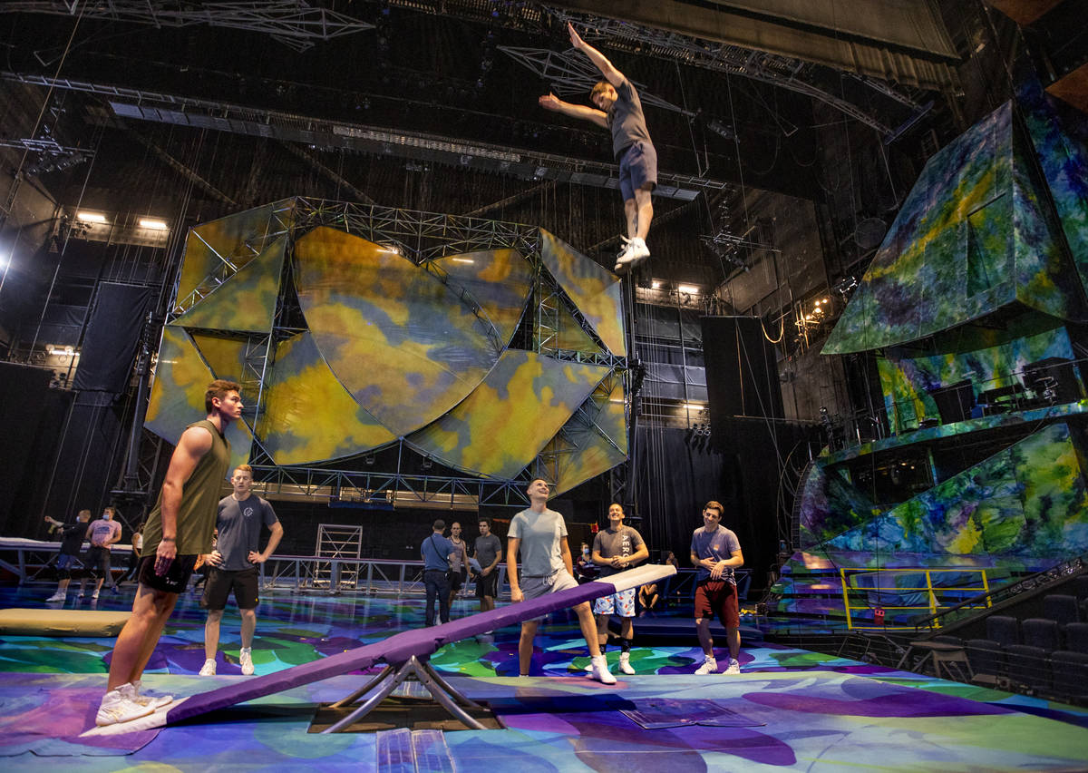 Acrobats practice on a teeter board during rehearsals for "Mystere," a Cirque du Sole ...