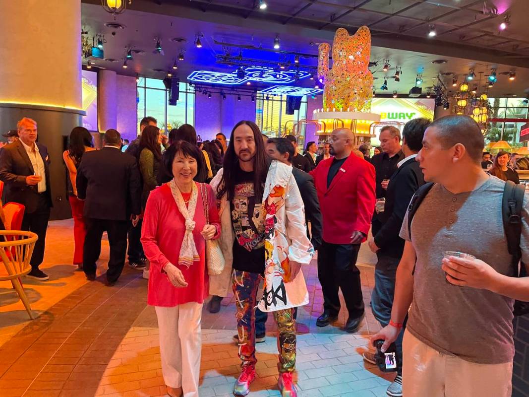 Steve Aoki poses in front of his restaurant, Kuru Kuru Pa Yakitori at Resorts World on Thursday ...