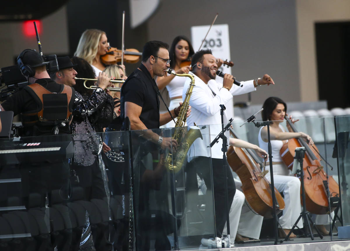 Members of David Perrico's Pop Strings band perform at Allegiant Stadium in Las Vegas on Monday ...