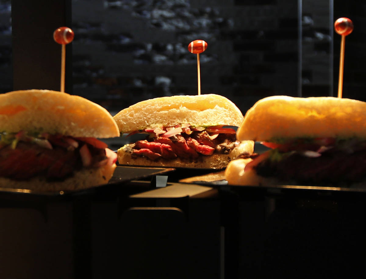 Tastes of Nation's carne asada torta burgers are served during an event of food and beverage ex ...