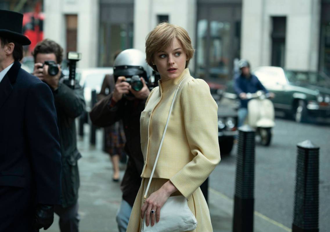 This image released by Netflix shows Emma Corrin in a scene from "The Crown." Corrin ...