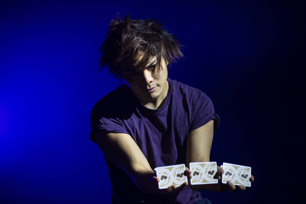 Illusionist Shin Lim performs card tricks onstage ahead of the reopening of his show, "Lim ...