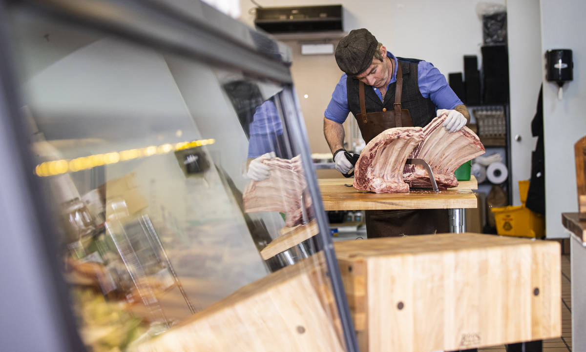 Martin Kirrane, owner and butcher at Featherblade Craft Butchery, carves beef at his shop in La ...