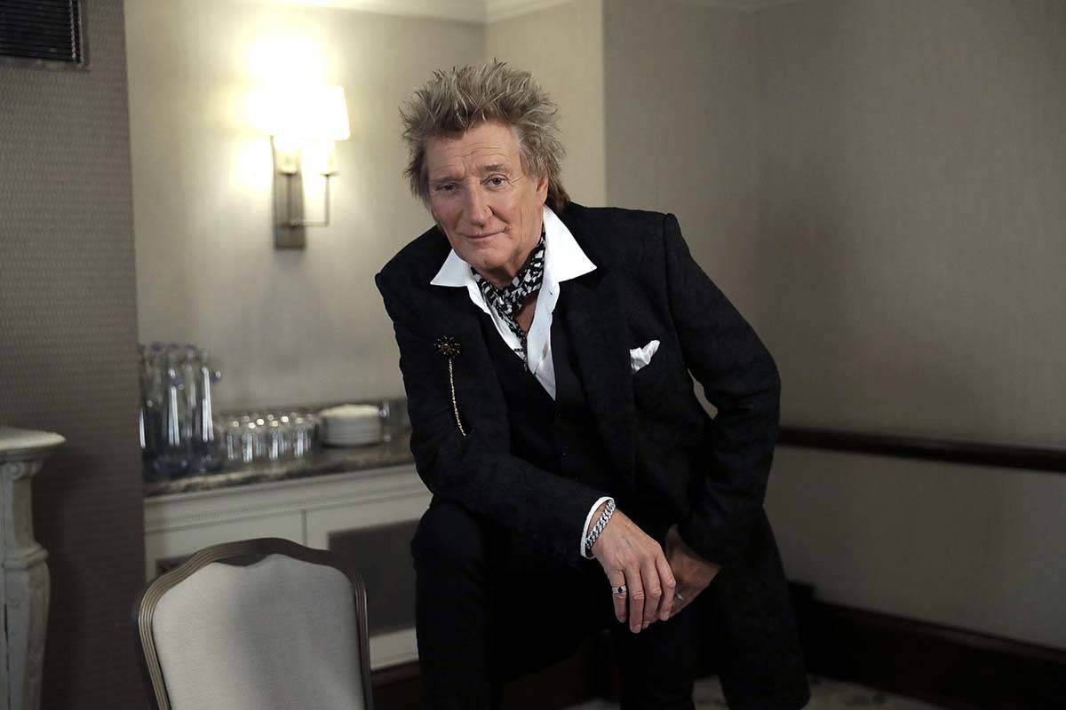 In this photo taken on Thursday, Nov. 14, 2019, British singer Rod Stewart poses for the media ...