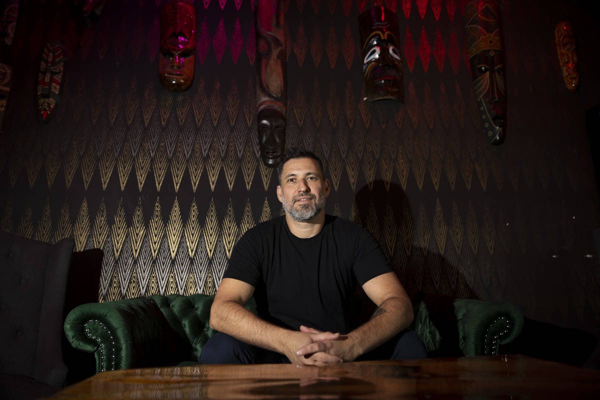 Bar manager Carlos Sanchez poses for a portrait at The Usual Place music venue in Las Vegas, Fr ...