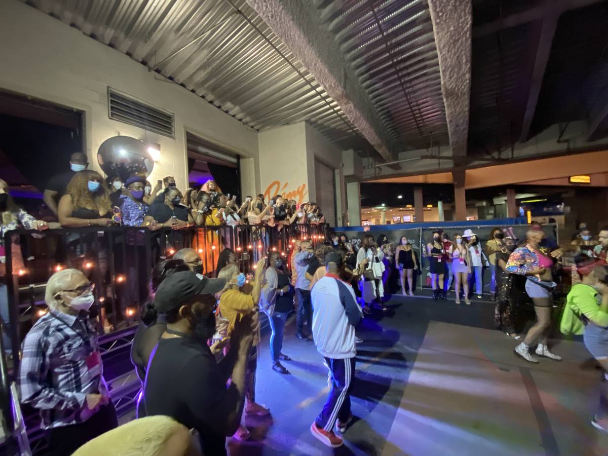 The Block Party scene at "Backstory Pass," Usher's pre-show immersive production, is shown on F ...