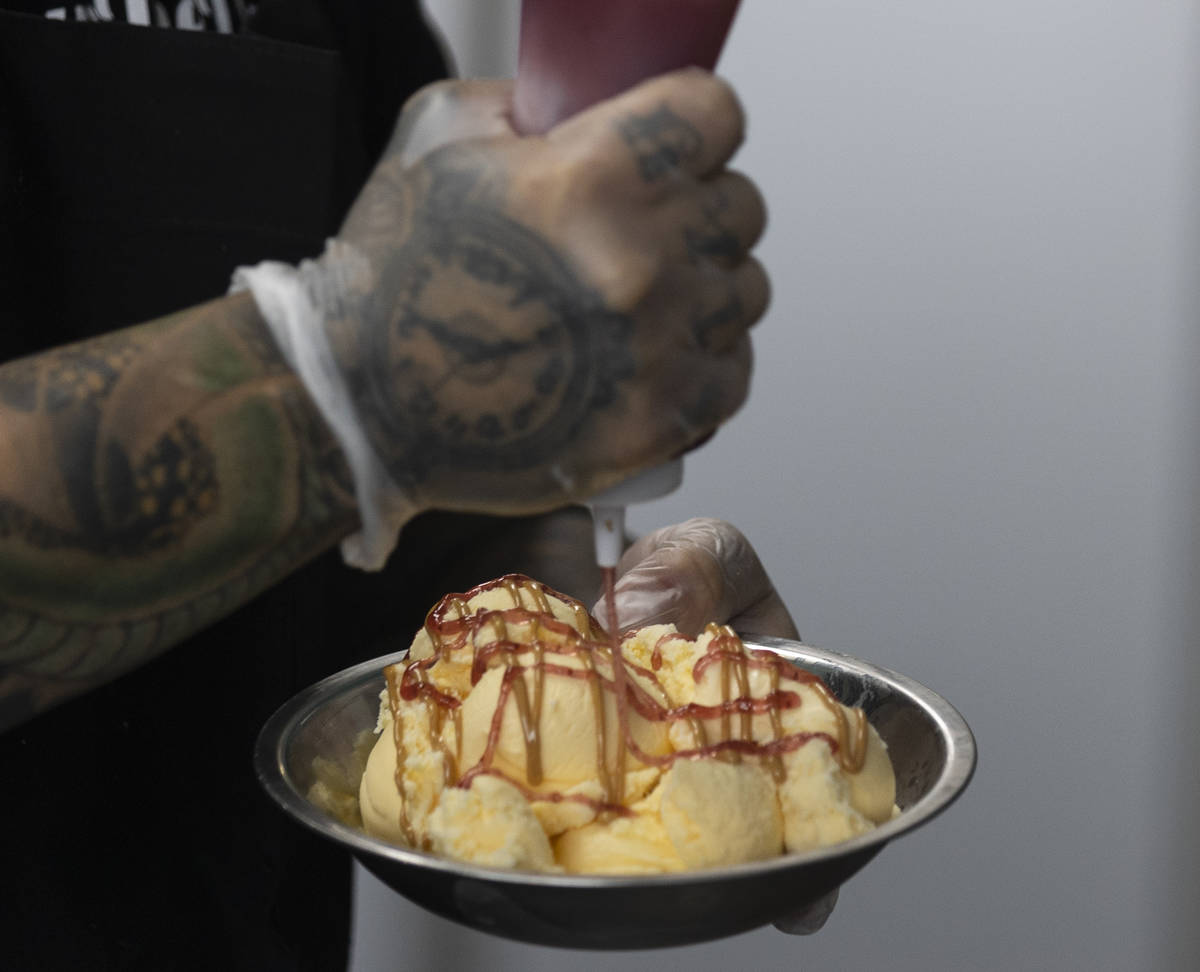 Marco Albanese, owner of Drill It Creamery, prepares peanut butter and jelly and strawberry jam ...
