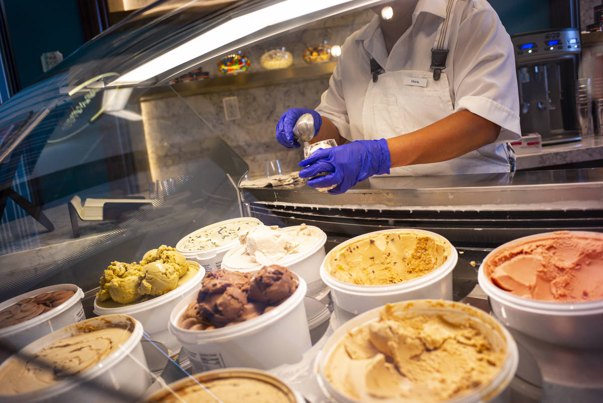 Fountain worker Maria Casian scoops ice cream at Craig's Vegan in The District at Resorts World ...