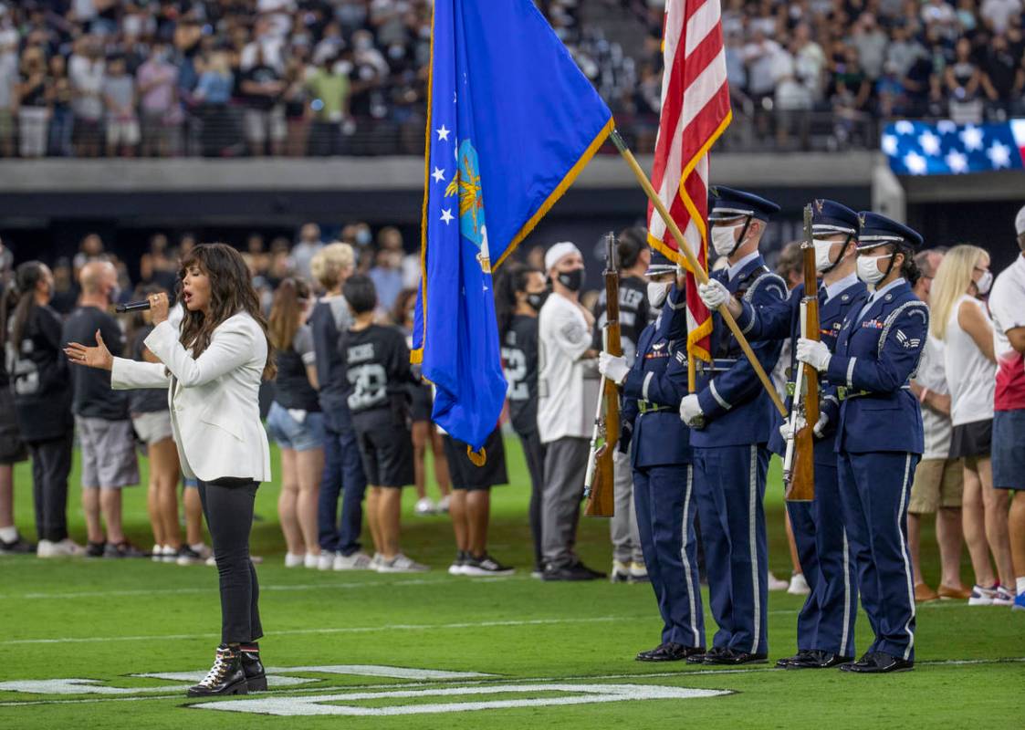 Marie Osmond sings the National anthem before the Raiders home opening pre-season NFL football ...