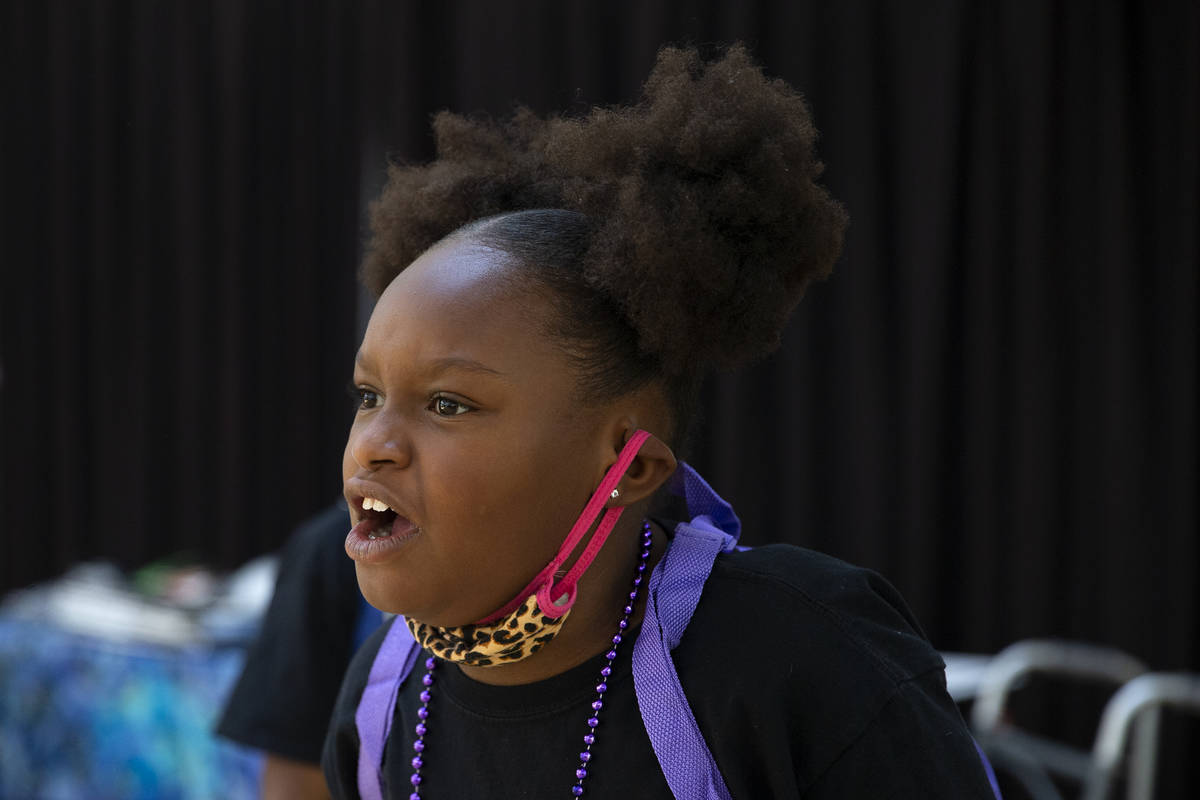 Angelea Davis, who plays Annie in Broadway in the HOOD's production of "Annie!" rehea ...