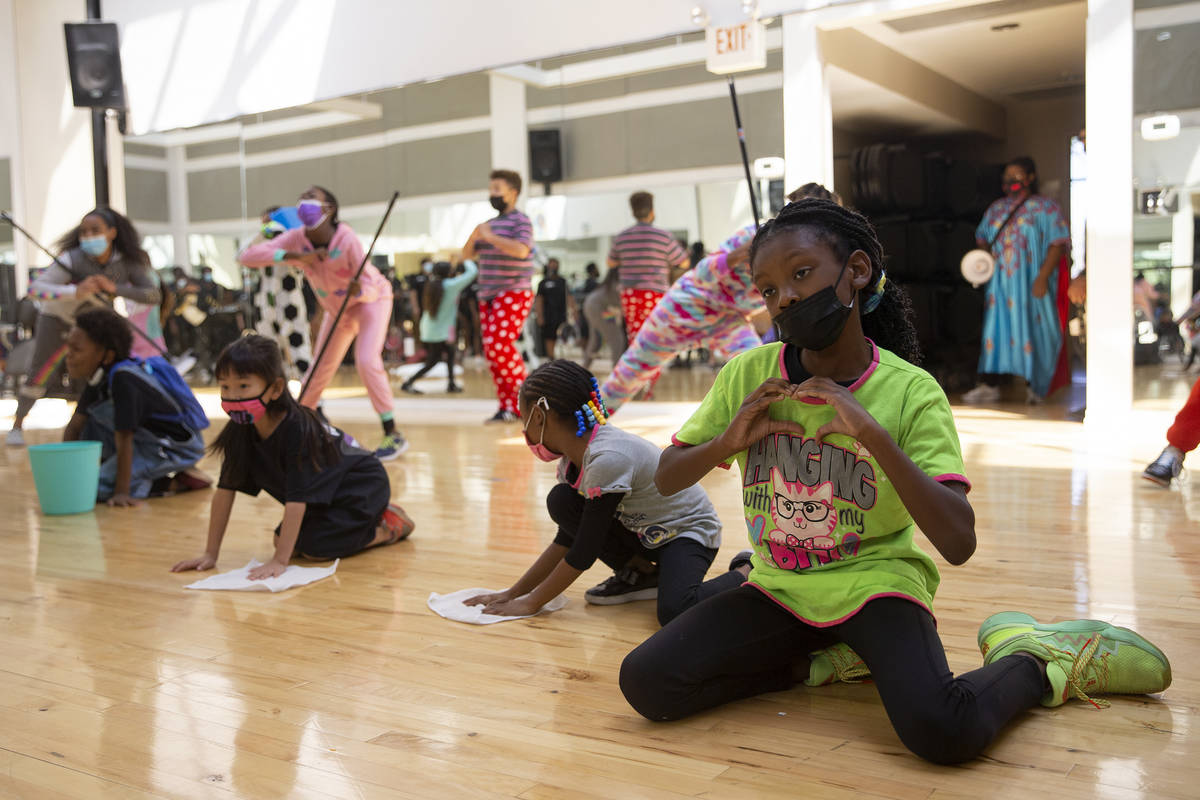 Savannah Denson, right, participates in a dance number during a rehearsal for Broadway in the H ...