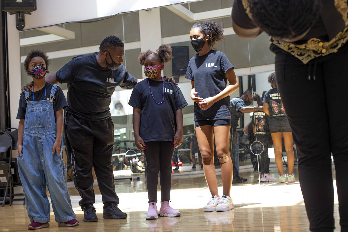 Torrey Russell, founding director of Broadway in the HOOD, directs a rehearsal for the group's ...