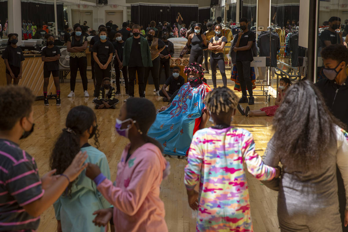 Cast members for Broadway in the HOOD's production of "Annie!" rehearse at West Las V ...