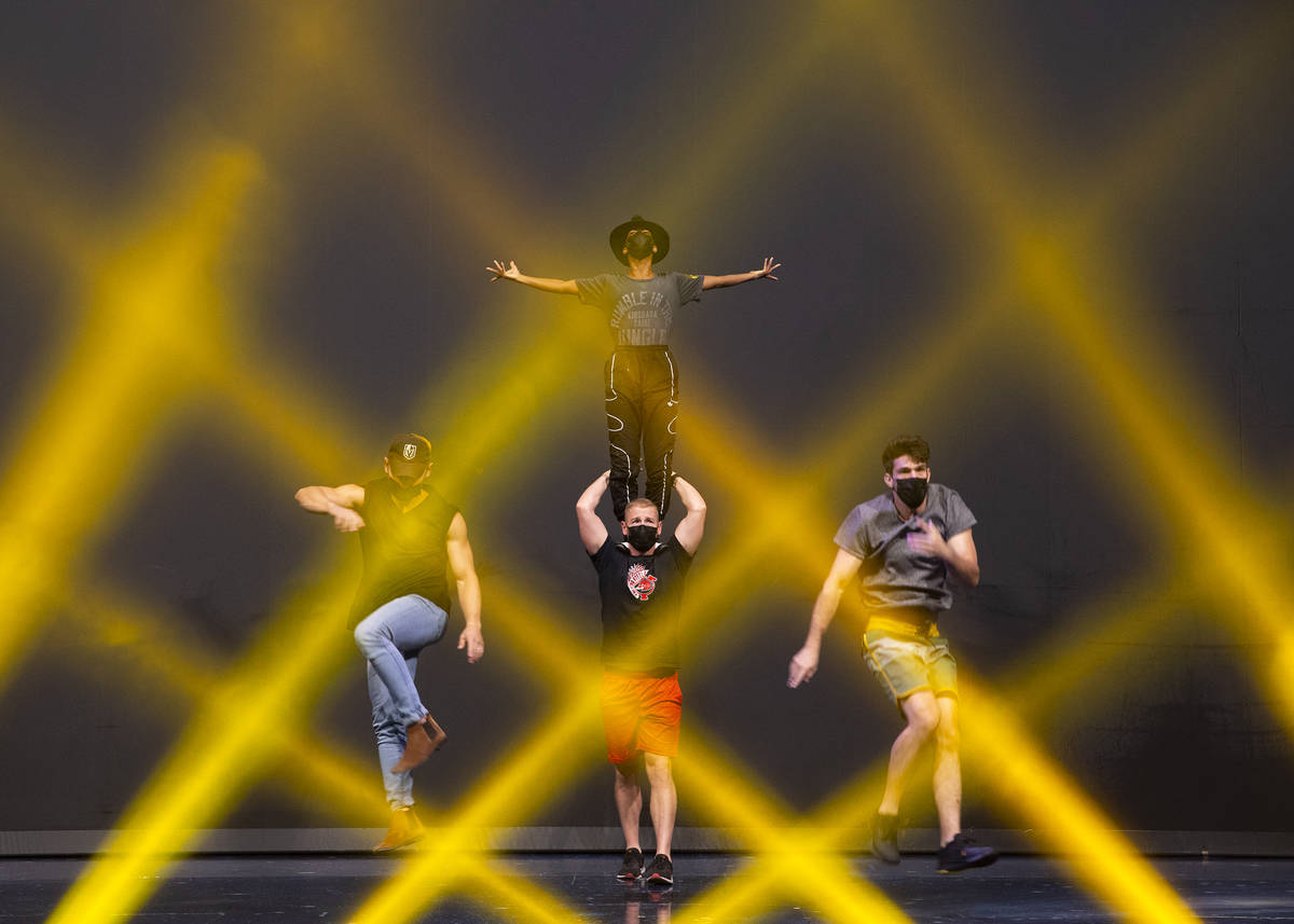 Performers rehearse for Michael Jackson One by Cirque du Soleil in the show's theater at Mandal ...