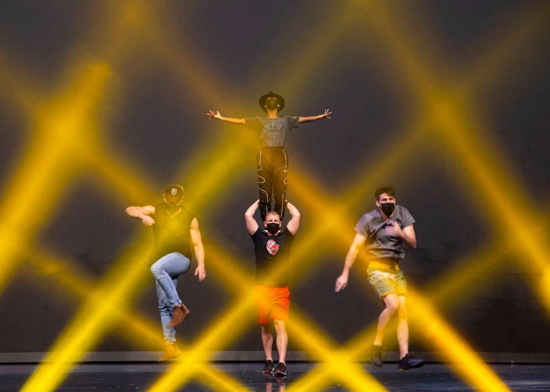 Performers rehearse for Michael Jackson One by Cirque du Soleil in the show's theater at Mandal ...