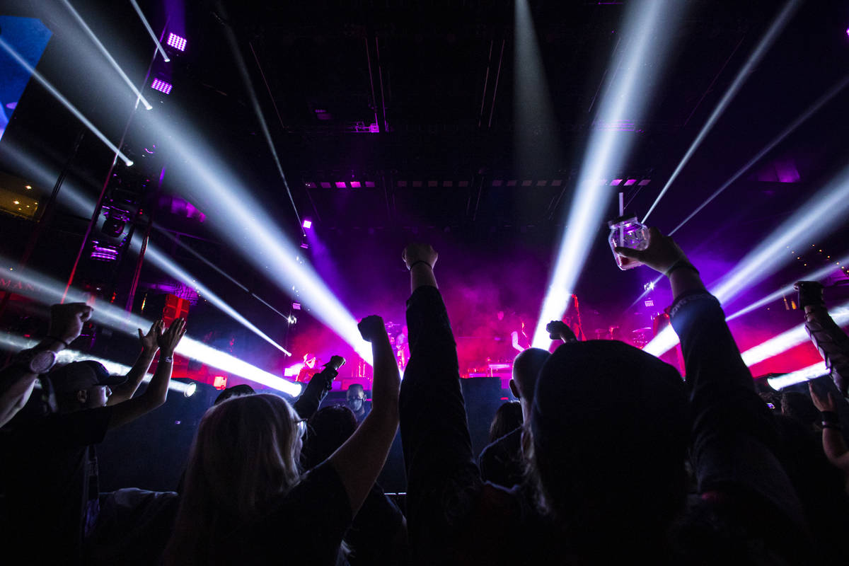 People cheer as Thievery Corporation performs during Psycho Las Vegas at Mandalay Bay in Las Ve ...