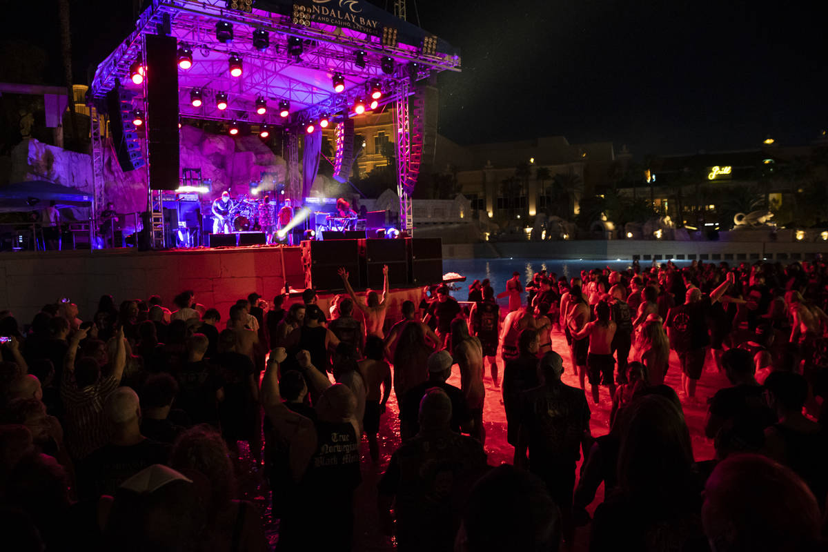 People mosh in the water at the beach stage as Pig Destroyer performs during Psycho Las Vegas a ...
