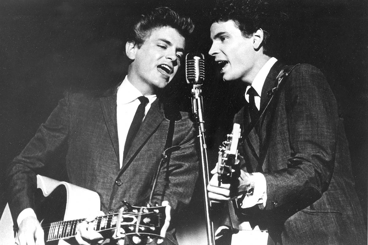In this July 31, 1964, file photo, The Everly Brothers, Phil, left, and Don, perform on stage. ...