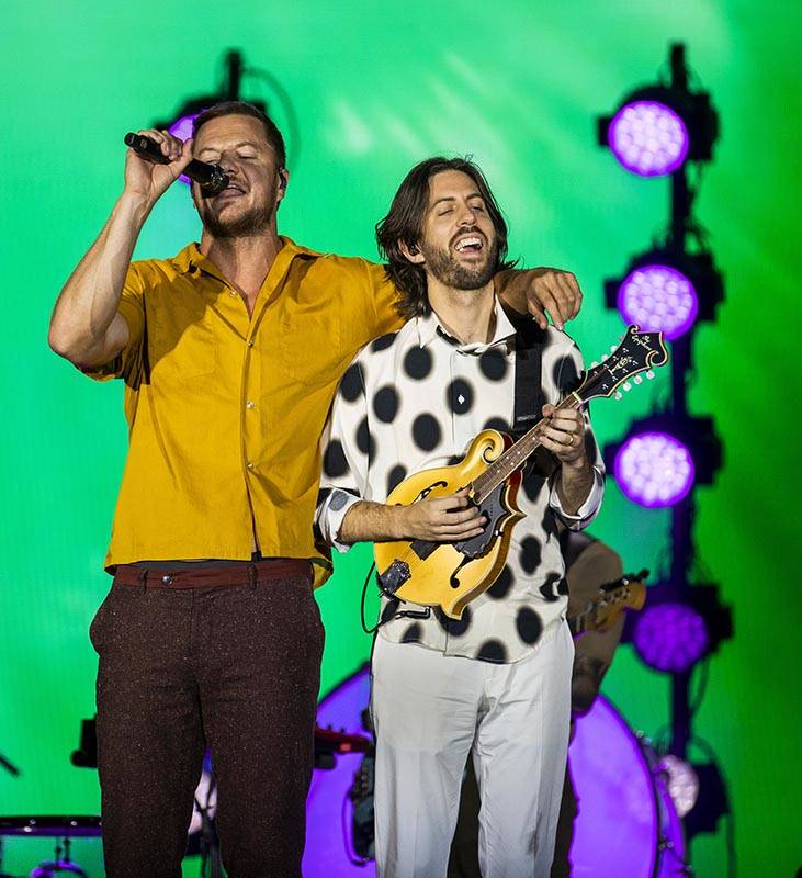 Imagine Dragons frontman Dan Reynolds, left, performs with mandolin player Daniel Wayne Sermon ...