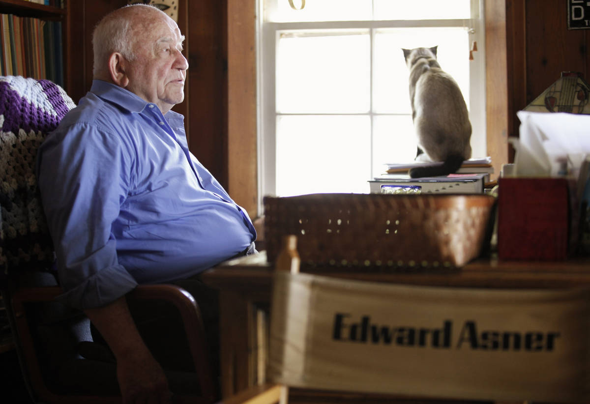 FILE - In this May 6, 2009, file photo, actor Ed Asner sits at his home in Valley Village neigh ...