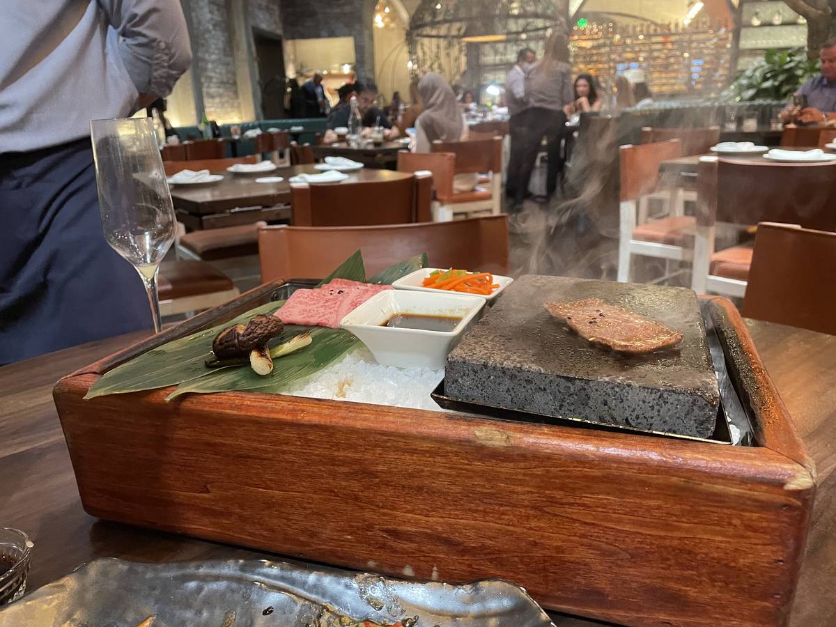 A5 Japanese Miyazaki Wagyu, prepared tableside on CATCH’s signature hot stone, feature yuzu s ...