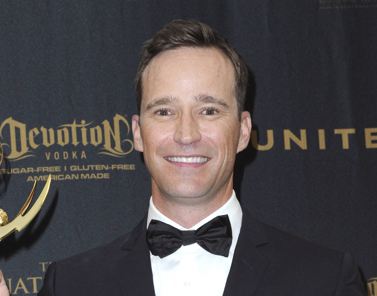 Producer Mike Richards poses in the pressroom at the 43rd annual Daytime Emmy Awards on May 1, ...