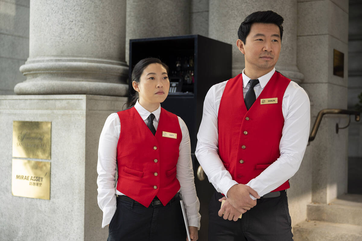 (L-R): Katy (Awkwafina) and Shang-Chi (Simu Liu) in Marvel Studios' SHANG-CHI AND THE LEGEND OF ...