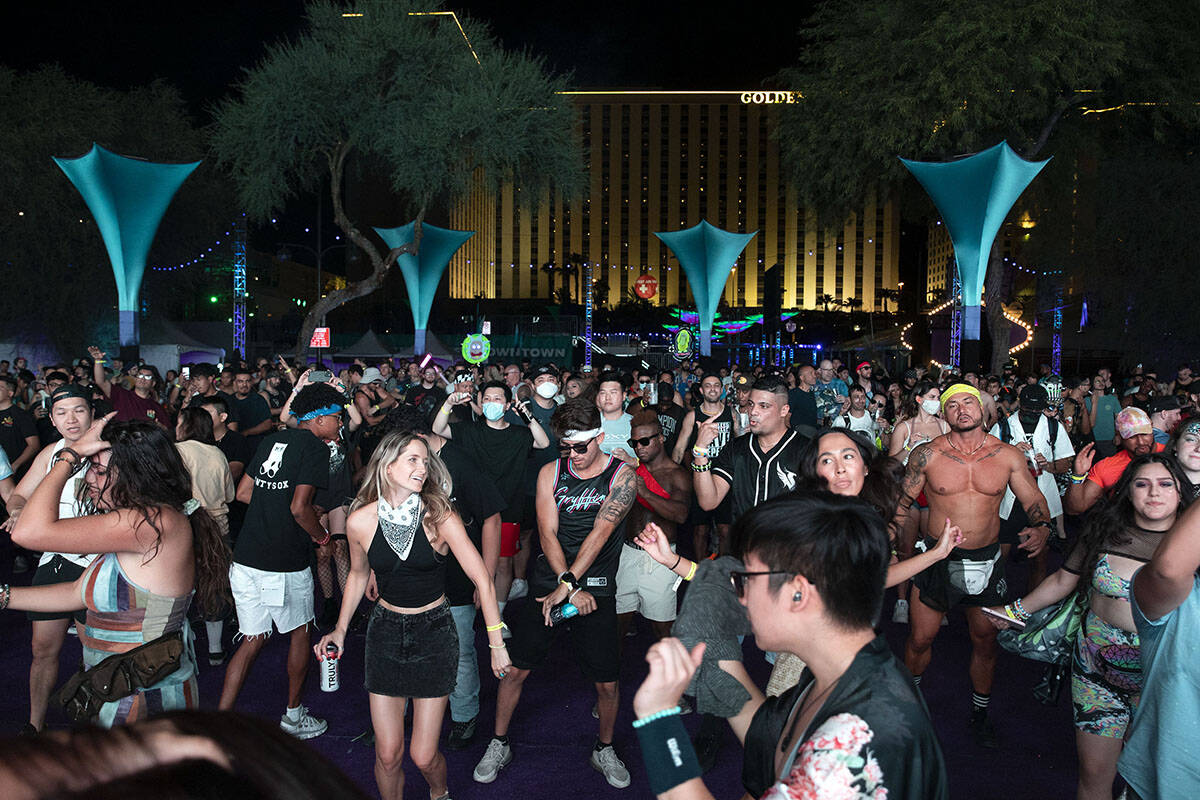 Fans dance to Devault's set during the Lost in Dreams music festival at the Downtown Las Vegas ...